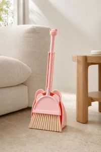 Soft broom bristle and dustpan edge detail for kids cleaning play