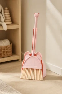 Child-safe rounded edge detail on mini broom and dustpan set