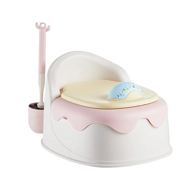 Toddler potty chair with integrated toilet brush in pink and blue