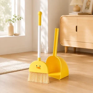 Front view of yellow duck kids broom with matching dustpan