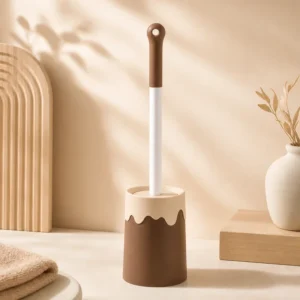 Toilet brush with cream-colored holder edge and brown base design