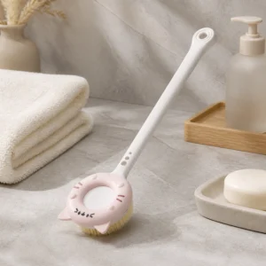 Front view of pink cat-shaped bath brush for bathroom cleaning