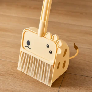 Side view of children plastic broom with giraffe body detail