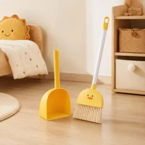 Yellow duck broom set in Montessori-style home learning space