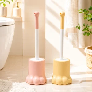 Woman cleaning toilet with pink cute paw toilet brush in pink bathroom decor
