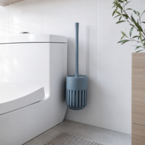 Gray blue suspended toilet brush mounted beside toilet