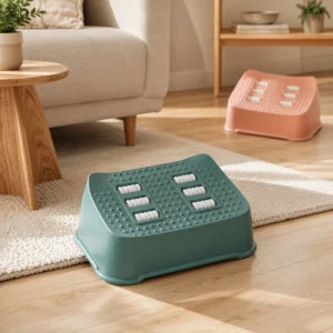 Green foot massage roller step displayed in a warm living room with a pastel pink option in the background